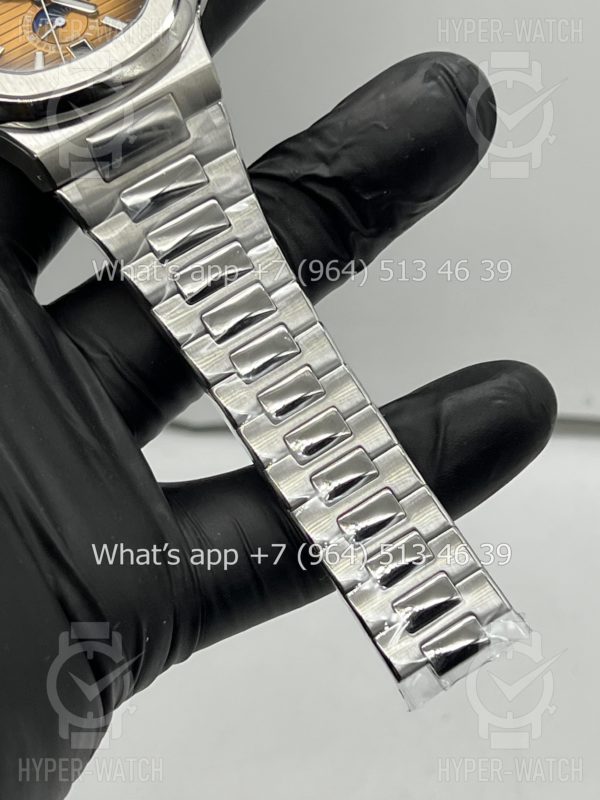 Фото 12 - Patek Philippe Nautilus 40mm Art 8313